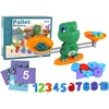 Lean Toys Matematinis Žaidimas Dinozauras su Svarstyklėmis