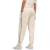 Moterų kelnės Puma ESS Graphic Animal Comfort smėlio spalvos 692464 87