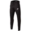 Nike NSW kartojamų raštų kelnės Poly JR AV8388-010