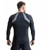 Pilki ilgomis rankovėmis rashguard su DBX Bushido logotipu