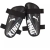 Puma King Strap 30935 01 Futbolo blauzdų apsaugos