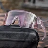 Rockbros dviratininko akiniai su fotochrominiais lęšiais, apsauga nuo UV spindulių ir korekcinių lęšių rėmeliu, skaidrūs - violetiniai