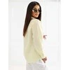 Šviesiai geltona moteriška palaidinė su spauda