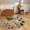 Bez Marki Okrągły sensoryczny dywan DINOZAURY 3D 133cm smėlio spalva NOYA Design