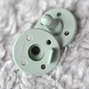 Dinaminis silikoninis čiulptukas MinikOiOi 2 vnt. Žalias kūdikiams 0-24m