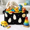Ecarla ORGANIZER - KOSZ - NA ZABAWKI - JUODA W GWIAZDY I BUTELKI MLEKA - 16x20CM