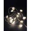 El. girlianda SNAIGĖS, 15 LED, 0,22 W, 3 V, šiltai balta, 1.4 m