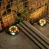Įsmeigiamas LED lauko šviestuvas įkraunamas saulės energija 8LED + 4RGB ø11x13cm, 2vnt.