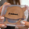 Kidnort Glitre beige silikoninis dantukas, 3M+ be BPA, sterilizuotas, dėklas, medicininis