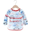 Maitinimo prijuostės seilinukas su rankovėmis ir MilaBaby apsauginio automobilio dubuo