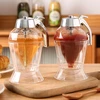 Medaus indelis su stovu Skaidrus medaus buteliukas 180 ml Medaus dozatorius Medus