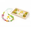 Melissa & Doug Medinių karoliukų vėrimo rinkinys Gėlytės 120 d. Melissa &amp; Doug, 14178