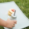 Minikoioi SILIKONINIS BUTELINIS PUODULIS VAIKAMS SU ŠIAUDU IR DANGIU 200 ML 6M+ Žalias