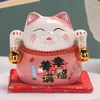 Myhomelife Skarbonka szczęścia porcelanowa Maneki Neko na poduszce 9,5cm rožinė