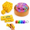 Okami Rinkinys 4in1 Squishy squishy koldūnų kukuliai GLITTER BUTTER CHEESE CLICKER LED