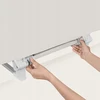 Sulankstomas NEŠIOjamas saugos turėklas lovai + krepšys 105 cm Lionelo Lora