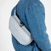 Vandeniui atspari nuo vagysčių apsaugota juosmens (sling) rankinė Pacsafe Metrosafe X Urban Sling, pilka, 5 l