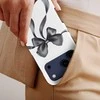 Voltuna Dėklas „Midnight Satin Bow“ su MagSafe Apple iPhone 13-17 modeliams