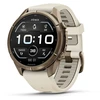 „Garmin fenix 9 Pro“ išmanusis laikrodis, 43 mm, titano, rudens aukso spalvos su kreminės spalvos / prancūziško pilko silikono dirželiu