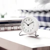 Arne Jacobsen Clocks Arne Jacobsen - LK stalo laikrodis - Ø11 cm - baltas