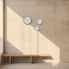 Arne Jacobsen Clocks Arne Jacobsen - Sieninis laikrodis stotelėje - Ø29 cm - Juodas