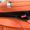 ATL Automobilio sėdynių tarpų užpildai(2 vnt.) – juodi, kairė + dešinė pusė
