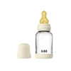Bibs SEILINTUKAI - stiklinis kūdikių buteliukas, apvalus, lateksinis, lėto srauto - dramblio kaulo spalvos - 120 ml
