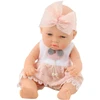 Lean Toys Lėlė kūdikis rožine suknele ir lankeliu 30 cm