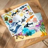 MELISSA & DOUG Daugkartinio naudojimo lipdukų knygelė „Gyvūnai ir jų namai“