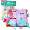 Lean Toys Minkšta jutiminė jūrų gyvūnų knygelė su švilpuku ir čežančiu popieriumi