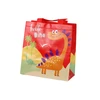 Lean Toys Raudonas dovanų maišelis su dinozauro motyvu