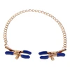 Sportsheets Cougar Adjustable Gold Chain Nipple Clamps with Mėlyna Tips