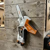 Garageprintslt Stihl GTA40 šakų pjovimo sieninis laikiklis