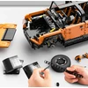 Nuotoliniu būdu valdomas 1:10 mastelio Hummer EV oranžinis