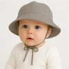 Kūdikių muslino kepurė New Baby iš lininio audinio