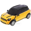 Mini Cooper S Countryman mastelio 1:24 Rastar 71700 geltonas valdomas automobilis