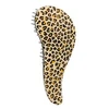 Dtangler plaukų šepetys su leopardo geltonos spalvos rankena