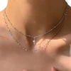 Atentuyi boho daugiasluoksnis sidabrinis vėrinys su kryželiu, chokeris su kryželiu, mažas vėrinys su kryželiu, palydovinė grandinėlė, religinis krucifikso vėrinys, dvigubos grandinėlės papuošalai moterims ir mergaitėms