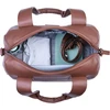 Childhome, kūdikio vystymo krepšys, mommy bag, kūdikio vystymo kilimėlis, daug skyrių, vežimėlio tvirtinimo detalės, peties dirželis, veganiška oda, 22l, mommy club signature, tamsiai ruda, tamsiai ruda