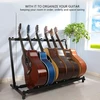 Dioche gitaros boso stovas su 5 gitarų stovais sulankstomas su neslystančiu guminiu paminkštinimu 5 elektriniams instrumentams (5 vietos)