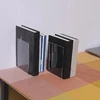 Geieold knygų atramos, skaidrios L formos knygų atramos, paveikslų albumų lentynos, popieriaus spaustukai, 8 vnt.