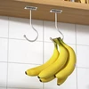 Josmimic, 2 vnt., lipnūs bananų kabliukai po spintele - sulankstomas bananų laikiklis su magnetais, virtuvės kabliukai pakabinimui, vietą taupantis ir apkrovos talpa iki 6kg, išlaiko bananus šviežius, sidabrinis