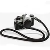 Objektyvas Kiwochy universalus fotoaparato dirželis, pagamintas iš minkšto, smulkaus pynimo nailono, tinkamas canon nikon sony fujifilm olympus leica ir kt. fotoaparatams, ilgis 100 cm, juodas