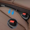 Sgqtgimu 2 vnt. automobilio sėdynės tarpų užpildų su 2 vnt. automobilinių kabliukų, automobilio sėdynės tarpų užpildas, automobilio sėdynės tarpų užpildas, skirtas apsaugoti daiktus nuo kritimo (juodas)