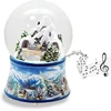 Minium Collection sniego gaublys žiemos kalėdų kalnų peizažas su tiltu, pagrindas – žiemos peizažas šviesiai mėlynas, su muzikos dėžute, aukštis 14 cm, plotis 10 cm, purtomas kamuolys 20256