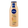 Nivea Q10 Firming + Bronze Losjonas kūnui moterims, 400 ml