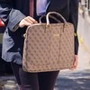 Guess 4G UpTown krepšys kompiuteriui 15” rudos spalvos