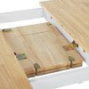 Beliani Išskleidžiamas valgomojo stalas HOUSTON šviesiai rudas/baltas 120/150 cm 90 cm pušies mediena