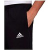 Adidas Essentials siaurėjančios atviro krašto kelnės M GK9222