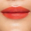 Revlon Kiss Cushion Lūpų balzamas 250 High End Coral 4.4 ml